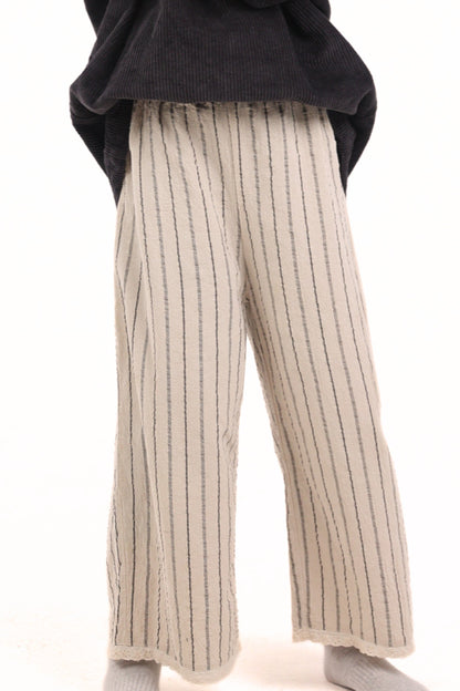 PANTALON LARGE À RAYURES MUNUI