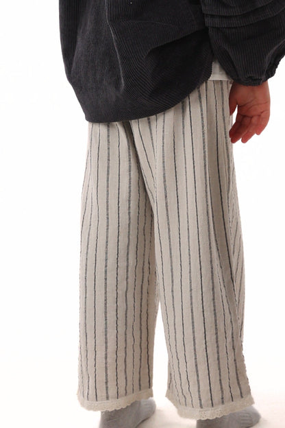 PANTALON LARGE À RAYURES MUNUI